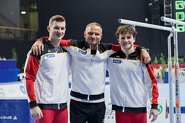 Glenn Trebing und Alexander Kunz mit Trainer Rolandas Zaksauskas. | Foto: DTB