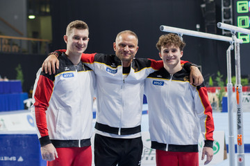 Glenn Trebing und Alexander Kunz mit Trainer Rolandas Zaksauskas. | Foto: DTB